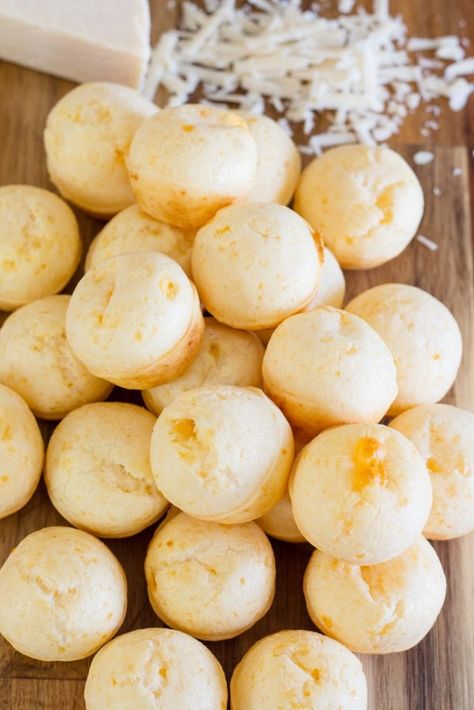 Easy to make Brazilian Cheese Bread is a traditional Recipe served as an appetizer or even for breakfast. Gluten Free and delicious makes this simple recipe a perfect choice to serve along with any meal. Throw ingredients in a blender and bake using a mini muffin tin for the perfect bite size cheese balls. #devourdinner #easyrecipe #easybreadrecipe #glutenfree #GF #braziliancheesebread #brazilianrecipe #pãodequeijo #appetizerrecipe #easyappetizer #breakfastrecipe #bread #yum #yummy Brazilian Cheese Buns, Brazi Bites Recipes, Brazilian Cheese Balls, Brazillian Cheese Bread, Cheese Bread Balls, Brazilian Food Traditional, Brazilian Cheese Bread Recipe, Breakfast Gluten Free, Sour Cream Biscuits