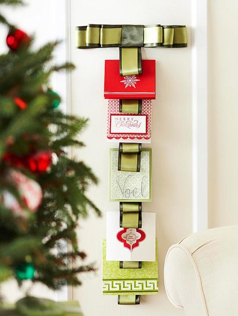 Create this Ribbon Christmas Card Hanger to display messages from loved ones. Plus, get 20 more holiday crafts. Christmas Card Display Ideas, Christmas Card Hanger, Card Display Ideas, Christmas Card Holder Display, Holiday Card Display, Christmas Card Holder, Christmas Card Display, Festive Crafts, Ribbon Christmas