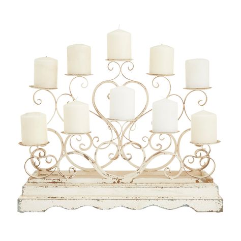 "White French Country Candelabra Illuminate your living room or bedroom with this candelabra candle holder and add an elegant romantic touch to your home corners Delight your guests and make any occasion extra special by adding lighted or flameless candles to this candelabra. Made with a sturdy base, it is perfect for creating an elegant atmosphere at your table top or mantel. Designed with white rubber stoppers at the base that prevent scratching as well as sliding around. This candelabra candl Distressed Candle Holders, Scrollwork Pattern, Candle Candelabra, Iron Candle Holders, Metal Candelabra, French Country Design, Tall Candle, Single Candle, Candle Plate