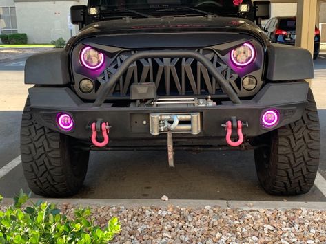 Black angry shark grill and pink halo LED Headlights & fog lights on a modified Jeep Wrangler JK, looks great. Angry Jeep Grill, Jeep Custom Paint, Jeep Wrangler Angry Eyes, Jeep Angry Eyes, Jeep Wrangler Rubicon Modified, 2000 Jeep Wrangler Sahara, Two Door Jeep Wrangler Accessories, Jeep Wrangler Accessories Exterior, Modded Jeep Wrangler