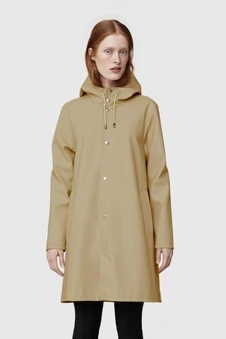 STUTTERHEIM MOSEBACKE RAIN JACKET SAND | PIPE AND ROW Stutterheim Raincoat, Girls Raincoat, Black Raincoat, Mens Raincoat, Long Rain Coat, Yellow Raincoat, Rain Jacket Women, Hooded Raincoat, Raincoats For Women