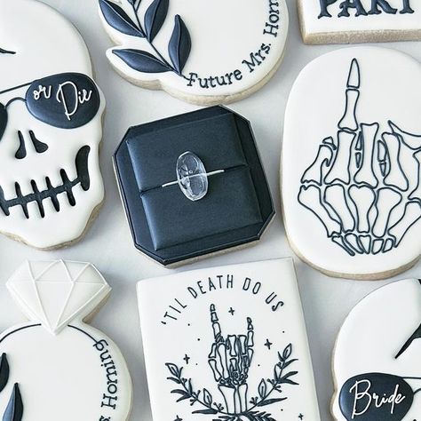 Best Bite Cookie Co. | Custom Cookie Art on Instagram: "RIP single life 💀💍  —Full look… ahhh I love how these turned out 🖤  #ripsinglelife #hereliessinglelife #tildeathdouspartycookies #tildeathdousparty #brideordie #bachelorettecookies #bachelorettepartyideas #bachelorettethemes #decoratedsugarcookies #ringboxcookies #bridetobe #azweddings #scottsdalefoodie" Bachelorette Baking Ideas, Wedding Cake With Cookies, Bride Or Die Cookies, Bach Cookies, Custom Wedding Cookies, Bridal Shower Cake Ideas, Rocker Wedding, Black Masquerade, Bachelorette Cookies