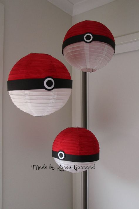 We made these Pokemon balls to hang above the food table. I purchased the white lanterns from Coles or Woolworths painted the top half red and just added black and white cardstock to middle. After the party they can hang in the childs bedroom with clear thumb tacks and thread. Pokemon Bedroom Ideas, Pokemon Balls, Pokemon Bedroom, Pokemon Decor, Pokémon Birthday, Pokemon Room, Pokémon Party, Pokemon Diy, Pokemon Ball