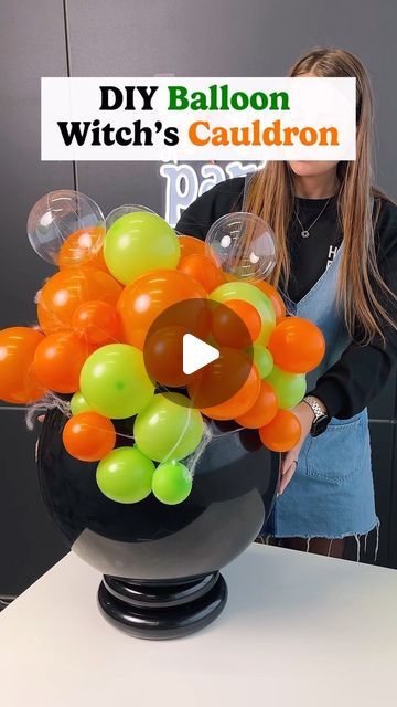 House of Party on Instagram: "Get crafty this Halloween and whip up your own balloon witch’s cauldron! 

 Start with two 260 balloons, add a giant 18-inch black balloon, shape it with another 260, and finish it off with fun 5-inch balloons for that bubbling effect. 

Perfect for adding some spooky magic to your party decor!

#balloontutorial #houseofpartyco #balloontips #balloontipsandtricks #quicktutorial #balloonhacks #ballooneducation #halloween #halloweenballoons" Halloween Balloon Garland Diy, Balloon Cauldron, 260 Balloons, Spooky Balloons, Balloon Hacks, Balloon Chandelier, Witchs Cauldron, How To Make Balloon, Black Balloon