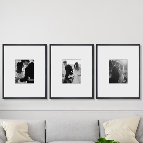 Elevate your home decor with the Vera Portrait Triptych Set from Homekor's online photo framing collection. Experience the best in custom photo framing and printing, and turn your cherished portraits into stunning wall art. Frame Photo Wall Ideas, Black And White Pics Above Bed, Black And White Above Bed Decor, 3 Portraits On Wall, Styling Wedding Photos On Wall, Black Frames Above Bed, Black Frames Above Couch, Framed Photos Above Bed, Framed Pictures Above Bed