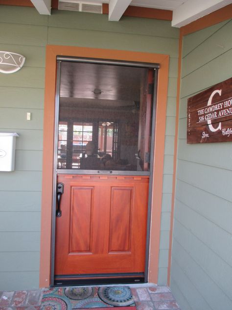 Dutch Door Pull Down StowAway Retractable Screen! The screen has 2 stopping points as requested by the customer. 1st Stopping point is at the shelf and the second is at the floor.  The benefit of this application is that the customer can just open the top half of their dutch door and enjoy the breeze while keeping the dogs/cats inside. If the customer wants more of a breeze or the dogs/cats are in the backyard they are able to fully open up the door and pull the shade to the floor. Dutch Door With Screen, Diy Dutch Door, Craftsman Bungalow Renovation, Screen Door Projects, Dutch Doors Diy, Front Door With Screen, Mobile Home Doors, Vintage Screen Doors, Dutch Doors Exterior