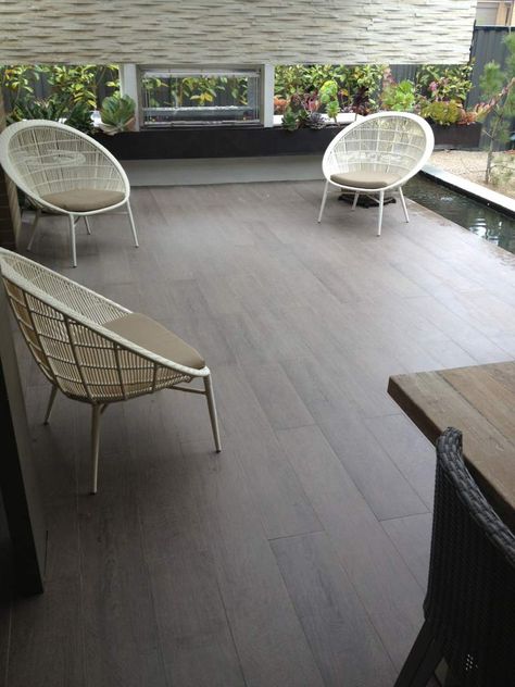 timber look floor tiles suitable for exterior use Alfresco Tiles, Balcony Tiles Floors, Tile Balcony, Timber Look Tiles, Outdoor Tiling, Gray Wood Tile Flooring, Merbau Decking, Grey Wood Tile, Wood Like Tile