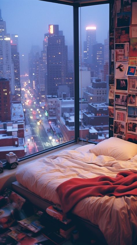 A Bedroom has a View of a Snowy City Aesthetic Apartment Exterior, Apartment Decor For Couples, City View Bedroom, Apartment With A View, Apartamento New York, New York Studio Apartment, Bedroom At Night, Nyc Bedroom, Snowy City