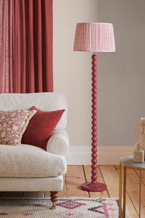 This stylish floor lamp has a painted wooden effect and a round base, featuring a co-coordinating fabric shade. A charming addition to any room within your home. 80% Wood, 15% Textile, 5% Metal. Floor Lamp Ideas, Red Floor Lamp, Stylish Floor Lamp, Red Floor, Wooden Floor Lamps, Floor Lamp Bedroom, Lamp Ideas, Living Room Red, Living Room Flooring