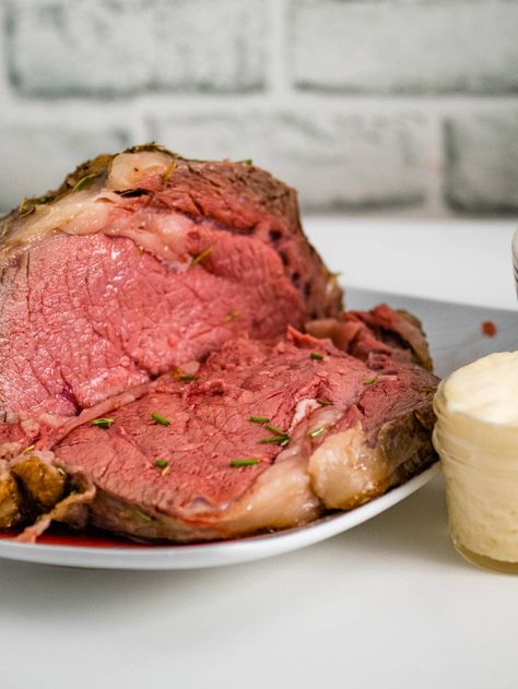 Sous vide prime rib is perfectly cooked beef! Cook your standing rib roast with a sous vide for tender and delicious beef cooked exactly how you want it. The perfect centerpiece for a holiday celebration! Sous Vide Roast Beef, Sous Vide Prime Rib, Sous Vide Ribeye, Beef Rib Roast, Ribeye Roast, Standing Rib Roast, Sous Vide Recipes, Prime Rib Roast, Rib Roast