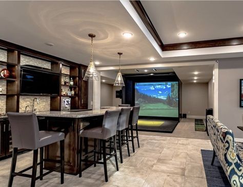 Game Room With Golf Simulator, Golf Simulator Room With Bar, Golf Simulator With Bar, Golf Basement Man Cave, Basement With Golf Simulator, Garage Gym And Golf Simulator, Man Cave Golf Simulator, Golf Simulator Man Cave, Indoor Golf Simulator Man Cave