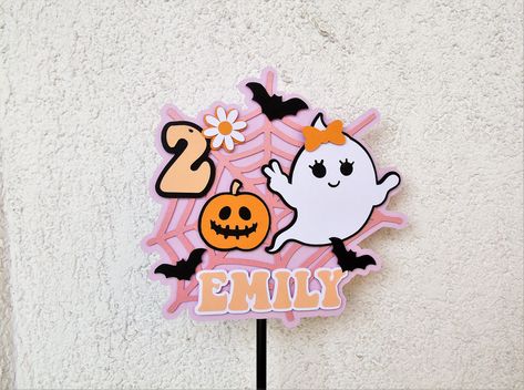 This lovely groovy spooky cake topper will be the cutest addition to your little's Spooky one birthday party! DETAILS: * made with quality cardstock  * personalized with your name and age * attached to a black straw on the back * layered for dimension   SIZE: 7" (18 cm) wide and 6.7" (~17 cm) tall COLORS: Light pink, light purple, black, white, orange     Feel free to contact me if you want a  different color scheme, age or if you have a different idea. I'll be happy to create something just for Spooky One Birthday Party, Spooky One Cake, Spooky Cake Topper, Adventure Cake Topper, Two Spooky, Spooky Cake, 3d Christmas Cards, Spooky One, Photo Garland