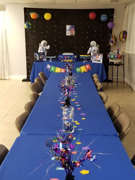 table decor. outer space theme birthday party Space Table Setting, Diy Space Table Decorations, Space Theme Party Table Decor, Space Birthday Table Decorations, Space Themed Table Decor, Astronomy Birthday Party, Space Graduation Theme, Space Theme Centerpiece Ideas, Space Themed Birthday Party Decoration