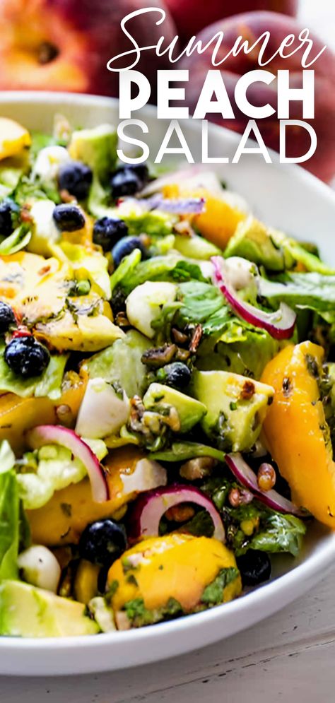 A close up view of a bowl of summer peach salad with peach, blueberry, avocado, mint, red onion, and mozzarella. Fruit And Greens Salad, Summer Salad With Peaches, Peach Blueberry Salad, Summer Peach Salad, Summer Green Salad, Salad With Peaches, Summer Suppers, Fresh Peach Recipes, Summer Pasta Salad Recipes