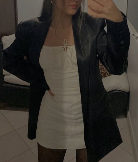 black leather oversized blazer, white mini dress and black thighs Mini Dress Oversized Jacket, White Mini Dress With Leather Jacket, Mini Dress With Oversized Jacket, Slip Dress Jacket Outfit, White Slip Dress Outfit Grunge, White Dress Leather Jacket, Black Leather Blazer Outfit, 19 Bday, Dress And Blazer Outfit