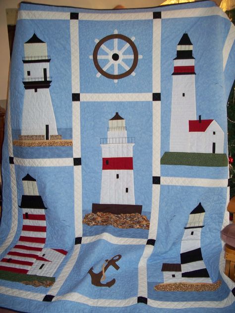 My granddaughter requested a lighthouse quilt, so I designed and appliqued this quilt for her. Lighthouse Quilt, Boat Quilt, Boys Quilt Patterns, Ocean Quilt, Nautical Quilt, Beach Quilt, Sea Quilt, Landscape Quilts, House Quilts