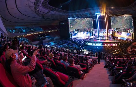 At the height of the global pandemic in October, more than 6,000 people packed into a new 25-acre stadium in Shanghai to watch one of the world’s biggest sporting contests. Another 45 million tuned in online, about as many as watched the six games of the 2020 NBA Finals on TV. The matchup was the League of Legends world championship -- a watershed moment for competitive gaming and its overseer Tencent Holdings Ltd. Nba Stars, Riot Games, Football Stadiums, The League, Nba Finals, Big Star, World Championship, Reality Show, Sport Event