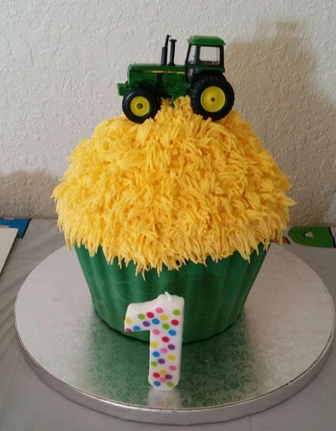 John Deere cupcake smash cake Tractor Smash Cake Boys, John Deere Smash Cake, Farm Smash Cake Boys, Farm Animal Smash Cake, Cupcakes For Boys Birthday, Tractor Smash Cake, Farm Smash Cake, John Deere Cupcakes, Cake Tractor