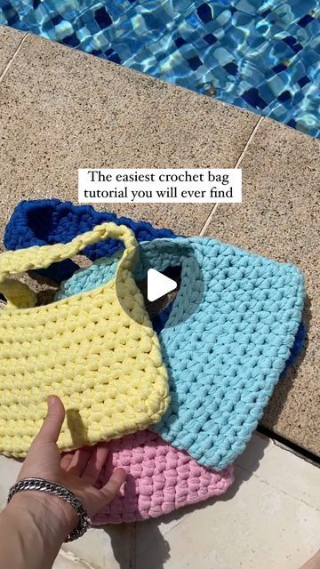 𝓫𝔂𝓰𝓪𝓵𝓴 | Crochet Patterns for Beginners on Instagram: "CROCHET A BAG👇 This is a super easy crochet bag pattern called “Trendy Mini Handbag” 🎀 It is a super cute mini crochet handbag that is perfect for everyday use! 👜 This pattern is perfect for beginner crocheters & the pattern teaches you exactly how to make the bag step by step. Get the pattern linked in my bio! 🎀 I have had many people tell me that this pattern was their first crochet project ever! Give it a try! 🌷 MATERIALS: If you would like a more lightweight bag use 2 strands of cotton ribbon yarn 🧶 if you would like a thicker & sturdier bag you can use 1 strand of T-shirt yarn! #crochet #crochetbag #crochetbags #crafts #easycrochet #crochettotebag #crochettutorial #crochetinspiration #crochetersofinstagram #crochetpatt T Shirt Yarn Bags Free Pattern, T Shirt Crochet Bag, T Shirt Yarn Crochet Bag Pattern Free, First Crochet Project For Beginners, T Shirt Yarn Crochet Bag, T Shirt Yarn Bag, Easy Crochet Tote Bag, Cute Mini Crochet, First Crochet Project