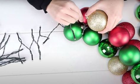 Diy Ornament Garland Christmas Balls, Diy Ornament Garland, Ornament Garland Diy, Diy Christmas Bulbs, Diy Christmas Ball, Outdoor Garland, How To Make Garland, Christmas Lights Garland, Dollar Store Christmas Crafts