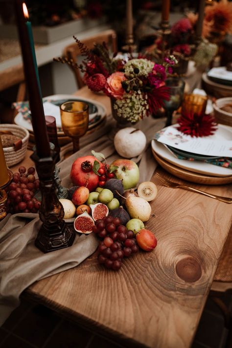 Seasonal fruit and vegetables decor on rustic autumnal wedding tablescape with large dark candlestick holders and dried flowers | Nicola Dawson Photography Table Decor With Vegetables, Fruit Wedding Centerpieces Fall, Thanksgiving Table Decor With Fruit, Fruit And Flowers Wedding Decor, Winter Fruit Tablescape, Fruit Wedding Decoration, Floral With Fruit, Fruit Table Setting Wedding, Fall Fruit Wedding Decor