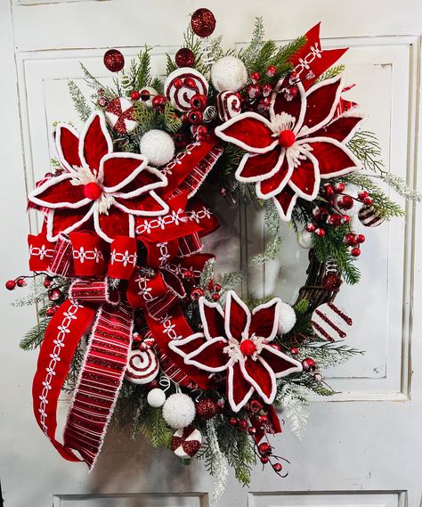 Traditional Poinsettia Wreath in Red  / Red Whimsical Floral Door Hanger  /  Red Velvet Holiday Decor  / Red White Poinsettia Porch Wreath This is a beautiful Traditional Red Velvet outlined in chenille Poinsettia Wreath, but will fit in well with most holiday decor. Stunning for the Holidays but perfect for the entire Winter Season! The red and white ornaments and picks, flocked berries and variety of mixed winter greens  adds to the beauty. To finish off design is a beautiful red velvet with white stitching and red and white sparkle wired ribbon bow. This is ready to Ship to US lower 48! *  I have sprayed the wreath with UV protectant to protect it to last season after season, and to preserve it's beauty. *  I recommend   hanging the wreath on a door covered by a porch or awning. or over Kitchen Organizing Ideas, Homemade Christmas Wreaths, Red Christmas Wreath, White Poinsettia, Fall Decor Wreaths, Porch Wreath, White Christmas Wreath, Poinsettia Wreath, Space Saving Kitchen