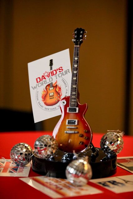 Guitar Party Decorations Ideas, Rock N Roll Centerpiece Ideas, Guitar Centerpiece Ideas, Rock And Roll Centerpiece Ideas, Guitar Centerpieces, Unique Table Centerpieces, Rock And Roll Party Decorations, Surrealist Ball, Bat Mitzvah Decorations