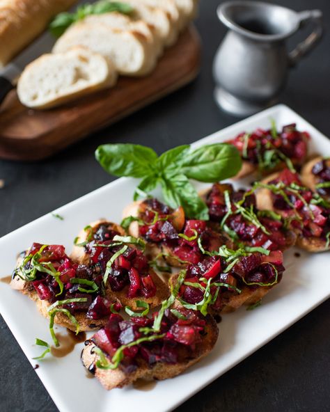 Beet Bruschetta with Balsamic Reduction - a new take on a classic. Beet Crostini, Beet Bruschetta, Balsamic Reduction Recipe, Beet Pesto, Italian Bruschetta, Green Snacks, Balsamic Reduction, Classic Italian Dishes, Pot Luck