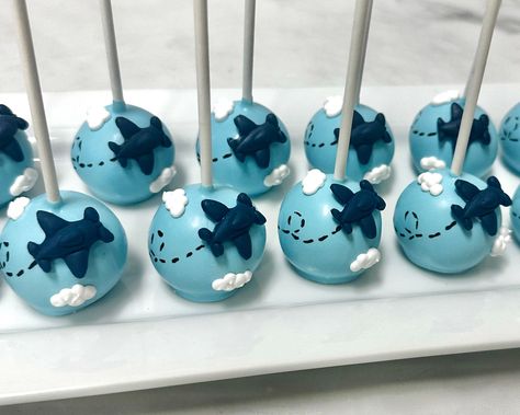 Airplane cake pops! Take your mouth on a vacation ✈️  #airplanecakepops #kupcakekitchen #wantcake #vacationfood #travelfood #designercakepops #cakepops #cakepop #cakepopping #cakepopart #cakepopmaker #cakepopper #cakepopcrazy #cakepoplife #cakepoplove #cakepoplovers #cakepopartist #customcakepops #customizedcakepops #customtreats #santaclarita #santaclaritavalley Airplane Cake Pops, Airplane Party Food, Planes Birthday Cake, Vintage Airplane Birthday Party, Airplane Birthday Party Decorations, Vintage Airplane Party, Vintage Airplane Birthday, Custom Cake Pops, Airplane Cake