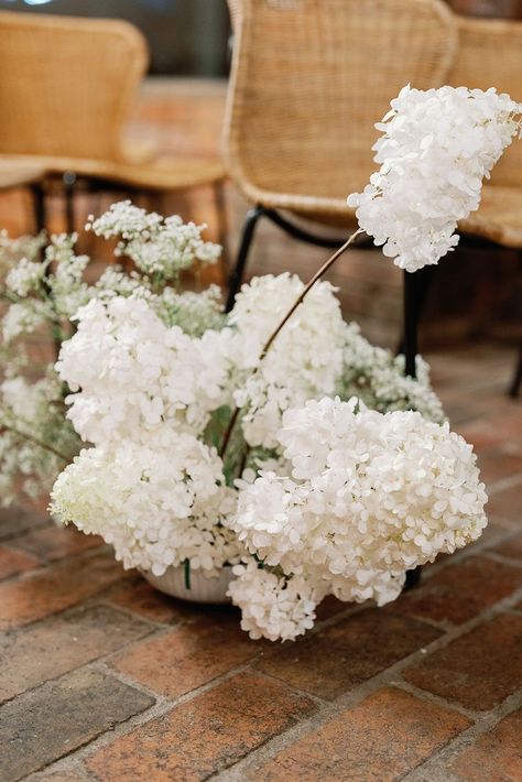 The dreamiest, fluffiest floral sculptures filled with hydrangeas, delphinium, dahlias, roses and cosmos in a nude, blush, champagne, white and blue colour palette. Florals and tulle styling by @tremellabotanicals, photography by @talesofromanceatelier. #tremellabotanicals #nofloralfoam #gentleflowering White Delphinium Bouquet, Delphinium Bouquet, Floral Sculptures, Floral Aisle, White Delphinium, Florist Studio, Ceremony Arrangement, Dahlia Bouquet, Panicle Hydrangea