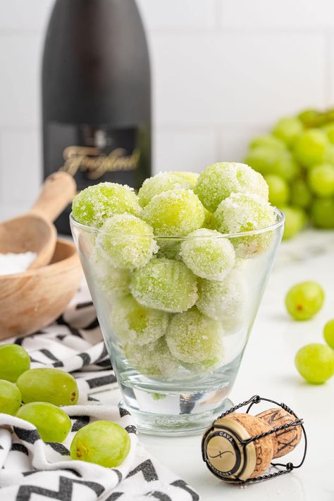 a couple of Sugared Champagne Grapes in a clear glass. Champagne Infused Strawberries, Champagne Grapes Recipes, Ice Cubes For Champagne, Champagne Ice Cubes, Champagne Appetizers, Sugar Grapes, Sour Patch Grapes, 12 Grapes, Fruit Ice Cubes