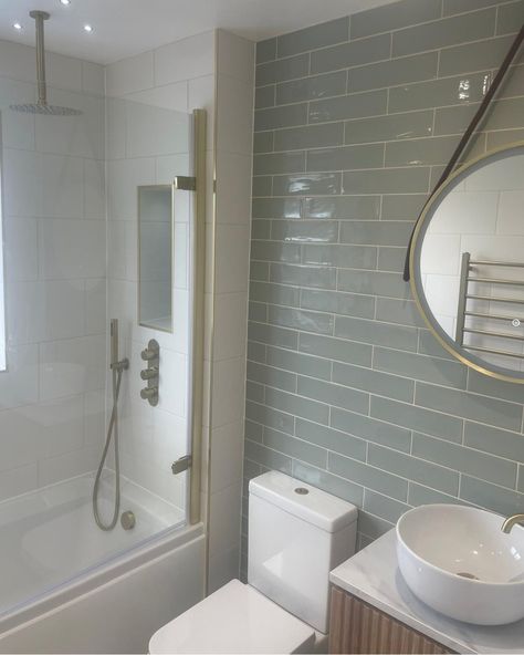 Another lovely customer photo, this time from Samways Bathrooms, featuring our Bronte Mist and Gloss White wall tiles. We love the vertical shower niche and gold details. Sage Green And White Bathroom, Vertical Shower Niche, Light Green Bathroom, Green Metro Tiles, Green Bathroom Tiles, Metro Tiles Bathroom, Light Green Bathrooms, Green Tile Bathroom, White Wall Tiles