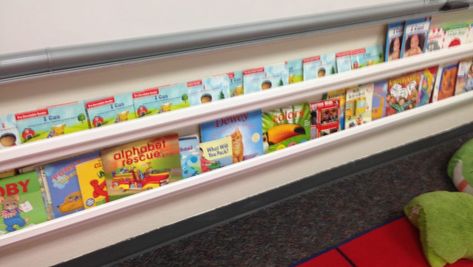 Tips to make rain gutter bookshelves for your classroom Bookshelves For Classroom, Magnetic Book Shelf Classroom, Classroom Wall Shelves, Diy Classroom Bookshelf, Classroom Bookshelf Ideas, Bookshelves Classroom, Classroom Furniture Ideas, Classroom Bookshelves, Bookshelf Classroom