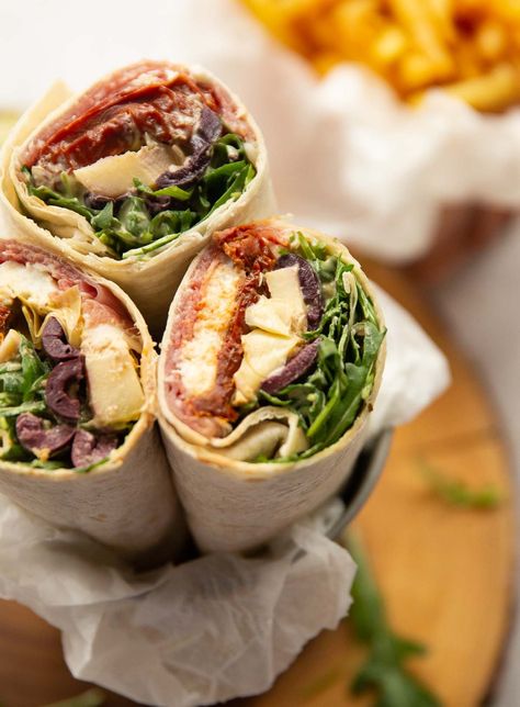 These Antipasto Wraps are absolutely loaded with flavour. They're quick, easy and perfect for lunch! #antipasto #italian #wraps #lunch | www.dontgobaconmyheart.co.uk Italian Wraps, Wraps Lunch, Wrap Recipes, Wrap Sandwiches, Easy Delicious, Pot Pie, Flatbread, Fresh Rolls, Healthy Lunch