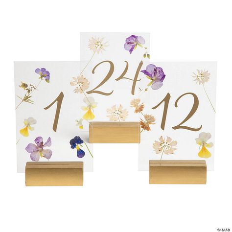 Bulk 24 Pc. Pressed Flower Table Numbers 1 - 24 | Oriental Trading Garden Table Numbers Wedding, Wild Flower Table Numbers, Pressed Flower Table Numbers, Pressed Flower Table, Garden Table Numbers, Flower Table Numbers, Wedding August, Floral Table Numbers, Event Display