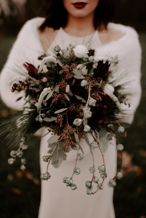 A Moody Winter Wedding Inspiration With Pops of Red #winterweddingideas #whiteweddingideas #blacktiewedding #winterweddingbouquet Moody Winter Wedding, Dark Wedding Theme, Winter Wedding Photos, Winter Wedding Bouquet, Wedding Themes Winter, Winter Wedding Decorations, Winter Wedding Flowers, Moody Wedding, Winter Wedding Inspiration