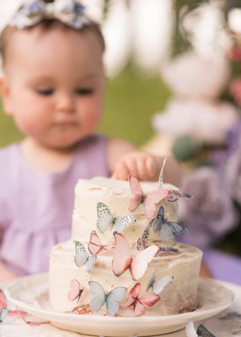 Florals, Butterflies, and Purple Themed Cake Smash for an adorable baby girl's first birthday Purple Themed Cake, Third Birthday Cake, Baby Girl Cake Smash, Elena Birthday Party, Themed Cake Smash, Butterfly 1st Birthday, Girl Cake Smash, Baby Girl Cake, Fairy Birthday Cake