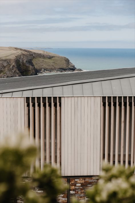 To create privacy for the first floor, we clad the windows on the public facing facade of this new house with wooden louvres. The beautiful Western Red Cedar cladding has silvered and compliments the shallow pitch zinc roof. Check our website to see more. Cedar Cladding House, Wooden Louvres, Surfboard Room, Western Red Cedar Cladding, New Build House, Zinc Cladding, Roof Cladding, Zinc Roof, Wooden Cladding