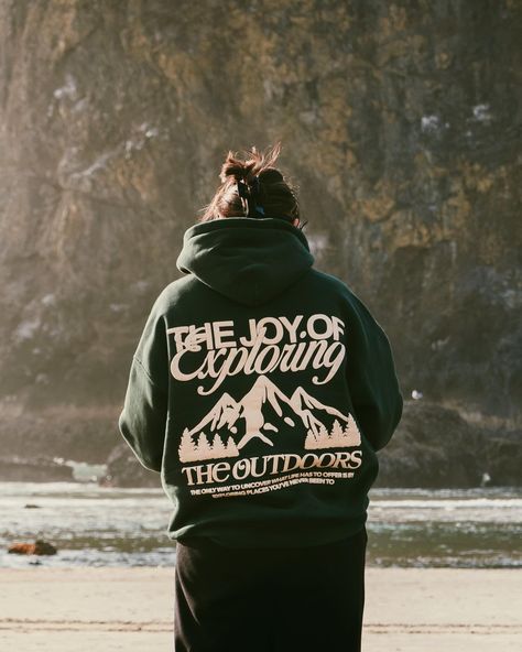 Smell the air, feel the breeze. Enjoy life’s simple pleasures 🏔️🌿🌲 Explore The Outdoors Hoodie available May 10th only @ vbrncy.com Hoodie Photoshoot Ideas Outdoor, Outdoor Clothing Photoshoot, Hoodie Design Ideas Aesthetic, Outdoor Aesthetic Outfits, Creative Hoodies, Product Photography Clothing, Outdoors Branding, Graphic Hoodie Design, Camp Merch