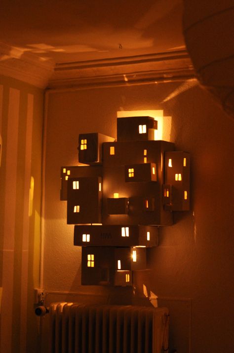 Related image Concert Decorations, Cardboard City, Colored Lights, Light Chain, Cardboard House, Cardboard Art, Cardboard Paper, Creative Lighting, Cardboard Crafts