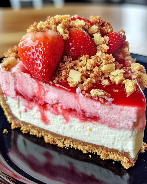 Strawberry Crunch Cheesecake 🍓🍰 A creamy cheesecake topped with a crunchy strawberry-flavored crumble, reminiscent of the classic ice cream bar. Ingredients: For the Crust: 2 cups crushed golden Oreo cookies 1/4 cup melted butter For the Cheesecake Filling: 24 oz cream cheese, softened 1 cup granulated sugar 3 large eggs 1 cup sour cream 1 tablespoon vanilla extract For the Strawberry Crunch Topping: 1 cup crushed golden Oreo cookies 1 cup freeze-dried strawberries, crushed 4 tablespoons ... Golden Oreo Cookies, Strawberry Crunch Topping, Strawberry Crunch Cheesecake, Crunch Cheesecake, Crunch Topping, Strawberry Crunch, Golden Oreo, Ice Cream Bar, Cheesecake Filling