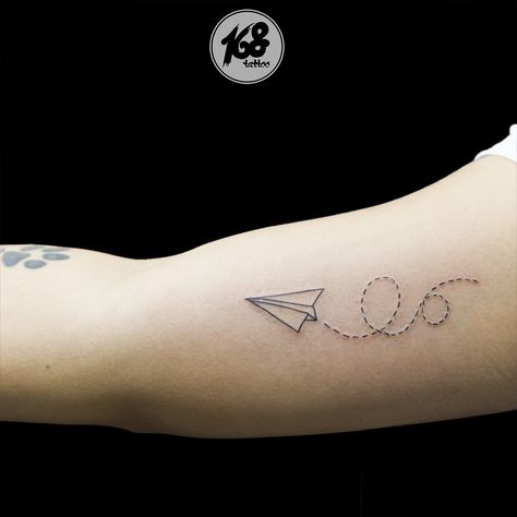 paper plane tattoo Fighter Jet Tattoo, Jet Tattoo, Paper Airplane Tattoo, Kids Initial Tattoos, Paper Airplane Tattoos, Paper Plane Tattoo, World Map Tattoos, Airplane Tattoo, Rocket Tattoo