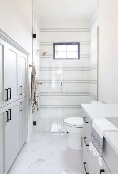 Coastal modern farmhouse bathroom tile ideas. Penny round tile mosaic farmhouse ticking stripes. Shower wall and tiles. Shower Tile Wall Ideas, Bathroom Shower Tile Wall, Shower Tile Patterns, Striped Bathroom, Shower Renovation, Pool Bathroom, Bathroom Window, Glass Shower Enclosures, Country Bathroom