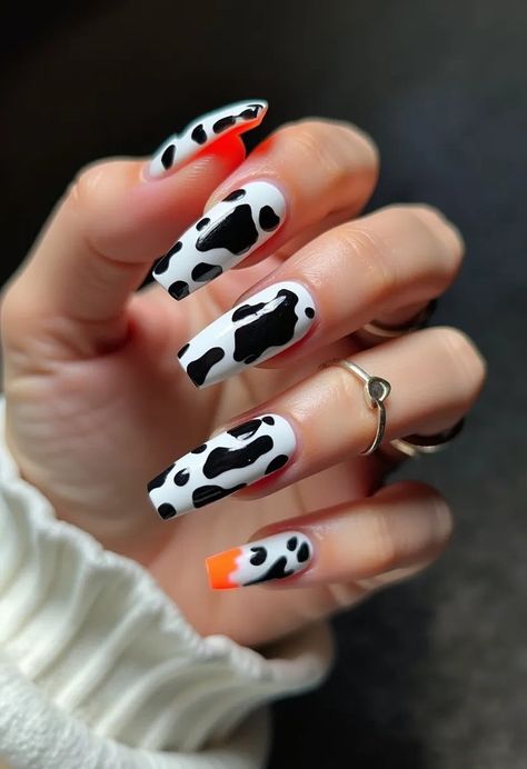 Get ready to moo-ve in style with these fierce cow print nails! 🐄✨ Perfect for any outfit or occasion. Curious about this look? Dive into more striking designs here 👉 https://www.nailspire.com/cow-print-nail-designs/striking-black-white-color-nail-art-idea-2280 #NailArt #CowPrintNails #FashionNails #NailInspo Cow Print Nails Acrylic, Print Nails Acrylic, White Polka Dot Nails, Cow Print Nails, Polka Dot Nail Designs, Chic Minimalist Style, Dot Nails, Stunning Nail Designs, Polka Dot Nails