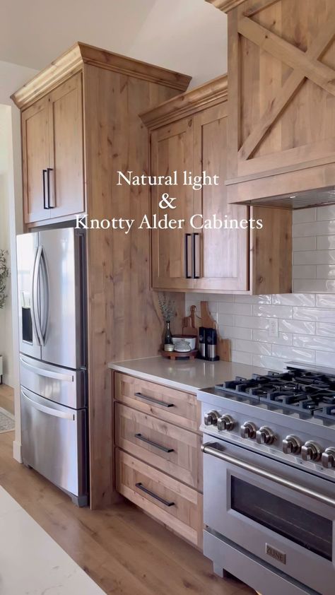 @HilltopHomestead | 🐝🌷Natural light really brings forward the rustic look of these knotty alder cabinets. I love how the stain emphasizes each grain pattern… | Instagram Light Stain Cabinets Kitchen, Farmhouse Stained Kitchen Cabinets, Adler Cabinets Knotty, Light Knotty Alder Kitchen Cabinets, Natural Knotty Alder Kitchen Cabinets, Natural Alder Kitchen Cabinets, Knotty Alder Kitchen Cabinets Farmhouse, Natural Cabinets Kitchen, Light Cabinets Kitchen