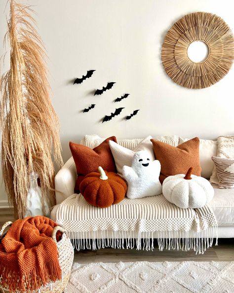 Fall decor, fall decorating, halloween decor, halloween decorations, ghost pillows, jumbo pumpkin pillows, faux fur teddy pillows, burnt orange throw blanket, burnt orange pillows, ghost decor, pumpkin decor, halloween decorating ideas, cozy throw blanket, sherpa pillow cover, ghost decorations, pumpkin decorations Halloween Pillows On Couch, Boho Fall Living Room, Minimalist Halloween Decor Living Room, Halloween Couch Decor, Halloween Party Living Room, Ghost Pillows, Sherpa Pillow, Living Room Halloween, Haloween Decor