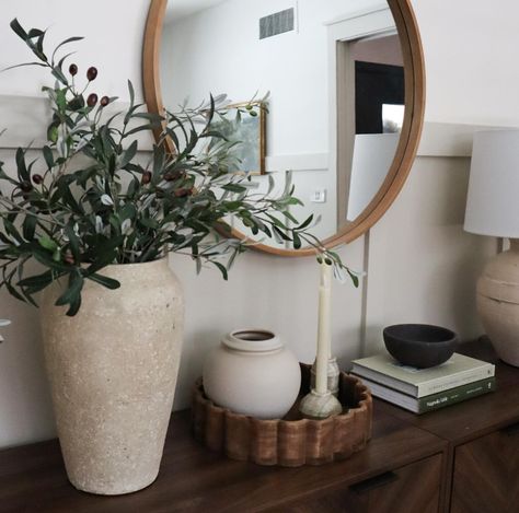 Detail images of the sideboard in the breakfast nook - I have 6 olive branch stems in the vase ✨comment shop if you want the links messaged to you #diningroomdecor #sideboardstyling #neutralhomes #modernorganicdecor #breakfastnook Olive Branches In Vase, Branches In Vase, Side Board Styling, Branch Vase, Modern Organic Decor, Vase With Branches, Olive Branches, The Breakfast, Olive Branch