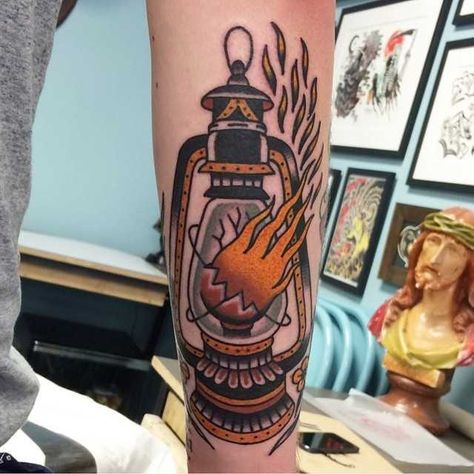 Traditional style broken lantern tattoo by Chris Collins Lantern Tattoo Ideas, Traditional Lantern Tattoo, Cool Meaningful Tattoos, Lantern Tattoo Design, Traditional Tattoo Man, Lion Forearm Tattoos, Chris Collins, Lantern Tattoo, Anchor Tattoo Design