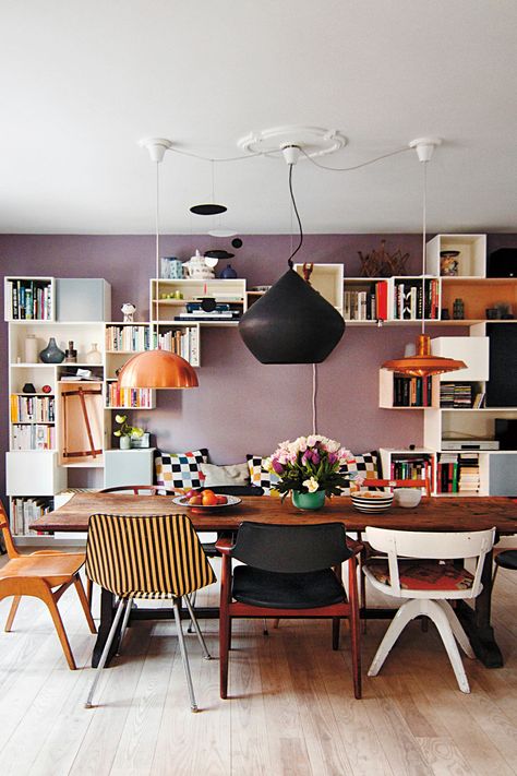 5 Stunning Homes We Want To Move Into Tomorrow #refinery29 http://www.refinery29.com/home-style-by-city#slide2 Copenhagen Proof that three lights are better than one... We love the mauve, lavender wall, mismatched chairs, and smart modular storage. New Yorker Loft, Mismatched Chairs, Eclectic Dining Room, Woven Dining Chairs, Eclectic Dining, Maximalism, Dining Room Inspiration, Room Decorations, Dining Room Design