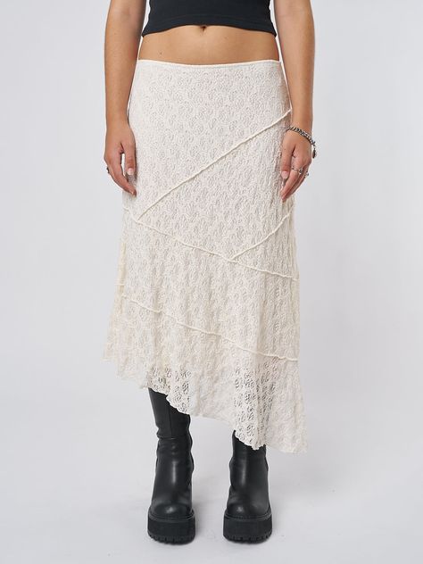 Discover your next go-to piece like our Nolia Cream Lace Asymmetric Midi Skirt, featuring boho lace material and sheer lace floral all over. For more women’s ethically made and aesthetic clothing y2k styles, Fairycore and more, shop online at Minga London. Asymmetrical Skirt Outfit, Mixing Patterns Fashion, Streetwear Fashion Aesthetic, Long Lace Skirt, Minga London, White Floral Skirt, White Lace Skirt, Maxi Lace Skirt, Wedding Skirt